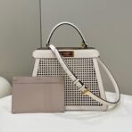 PEEKABOO ISEEU 34 IN WHITE PERFORATED CALFSKIN GOLD HARDWARE