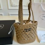 CROCHET BUCKET BAG 32 IN BROWN WOVEN RAFFIA EMBROIDED LOGO
